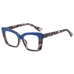Cat eye glasses frame with blue top and marble pattern lower half on white background