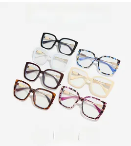 Detailed close-up showing seven stylish cat-eye frames with gold metallic accents
