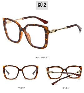 Multiple views of oversized tortoise shell cat-eye glasses with golden metal temples