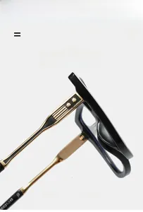 Detailed close-up of cat-eye frame temples with golden cross embossed metal hinge