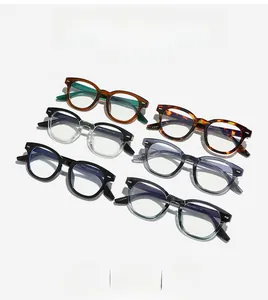 Flat lay of retro square glasses frames in tortoise and amber colors with non-slip temples