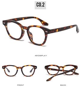 Detail view of round tortoiseshell glasses frames with front and side perspective