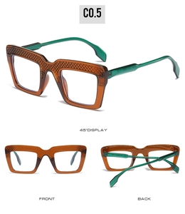 Detailansicht der quadratischen Brille mit strukturierter Bernsteinoptik und grünen Bügeln