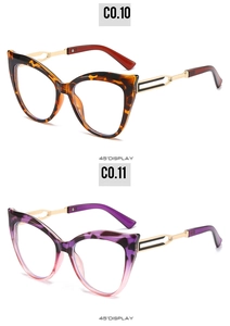 Cat-eye glasses frames with tortoiseshell and purple gradient finishes in a 45-degree view