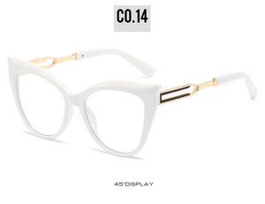 Detail view of cat-eye glasses frame with golden metal temples and geometric hollow design