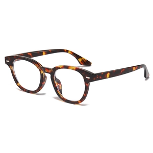 Classic round tortoiseshell eyeglasses frame with blue light blocking lenses and rivets