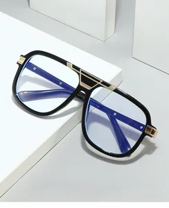 Detailed view of black aviator frames with gold metal accents and blue light coating