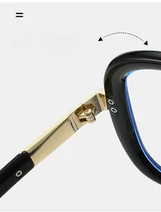 Close-up of durable golden metal hinge and screws on black and blue eyeglasses