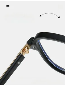Detail of durable gold metal hinge on large black frame aviator fashion glasses