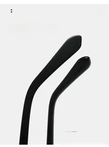Detail of sleek black curved mirror legs with arc design for comfortable wear