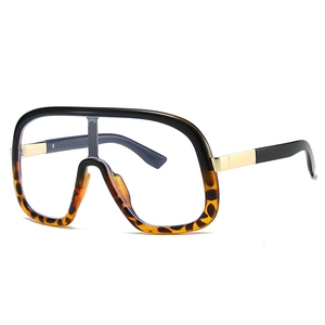 Oversized black and tortoise shell fashion glasses with gold metal splice temples