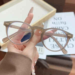 Vintage round tea brown eyewear frame model 12164 with a stylish minimalist finish