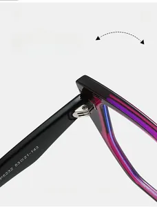 Detail of durable metal hinge on TR90 cat eye glasses with black and purple gradient frame