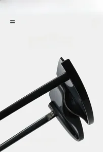 Detailed macro view of the durable hinge on these trendy semi-rimless cat eye sunglasses