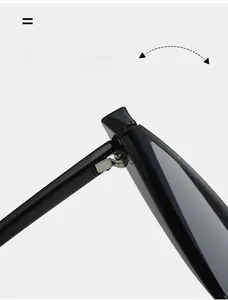 Detail of durable metal hinges on sleek black semi-rimless V-shaped sunglasses