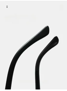 Detailed macro view of glossy black curved temples for ergonomic comfortable sunglasses fit