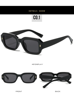 Macro detail of retro square sunglasses with thick black frames and gold rivet accents