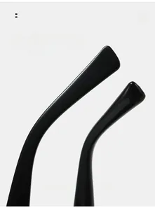 Macro detail of ergonomic curved black temples on square sunglasses for comfortable wear
