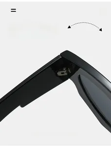 Detailed view of durable silver metal hinges on black polished cat-eye sunglasses