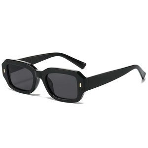 Retro black square sunglasses with thick frames and golden rivet details on white background