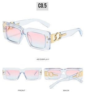 Detail view of square sunglasses with light blue frames and gold chain accents