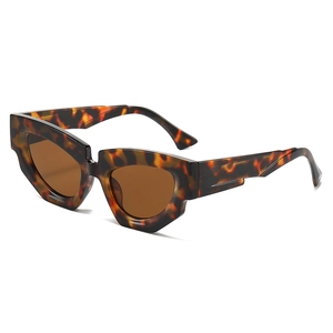 Chic tortoiseshell cat eye sunglasses with brown lenses and geometric temples