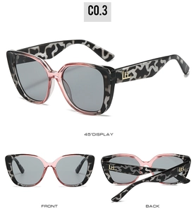 Vue sous trois angles de lunettes de soleil œil-de-chat avec motifs marbrés