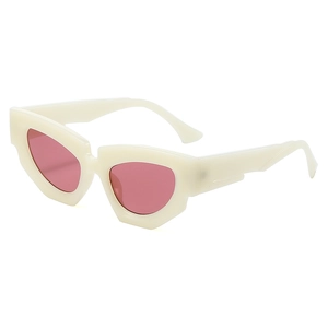 Fashionable geometric cat-eye sunglasses with cream frames and pink tinted lenses