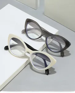 Close-up of cat-eye anti-blue light glasses in cream white and transparent grey frames