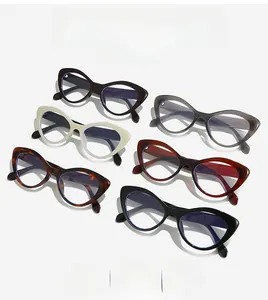 Stack of retro cat-eye anti-blue light glasses showing multiple stylish frame colors