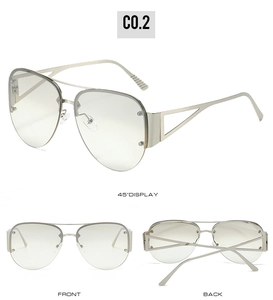 Detailed view of silver metal semi-rimless pilot sunglasses with hollow geometric temples