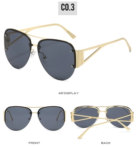 Detail view of gold semi-rimless square sunglasses with geometric hollowed temples