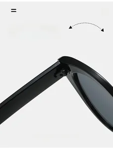 Close-up of durable reinforced hinges on sleek black cat eye sunglasses frame