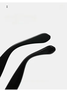 Detailed macro view of curved black sunglasses temples for a comfortable fit design