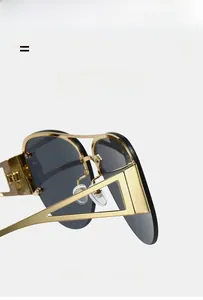 Detail of lightweight semi-rimless pilot sunglasses with super elastic gold metal frames