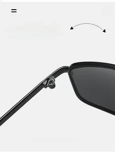 Gros plan sur la charnière métallique robuste des lunettes de soleil vintage noires