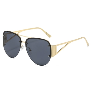 Classic gold metal semi-rimless aviator sunglasses with silver rivet accents and dark gray lenses