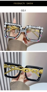 Detail of square birthday girl glasses with pearl lettering and gold chain temples
