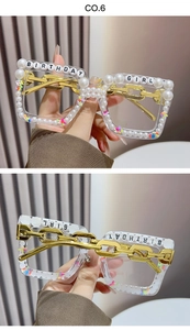 Detail of square glasses with pearls and Birthday Girl text on a gold chain frame