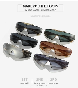 Collection of oversized wraparound sunglasses with metallic frames and diverse lens tints