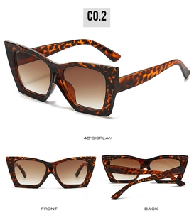 Detailed views of oversized tortoiseshell sunglasses with brown gradient lenses