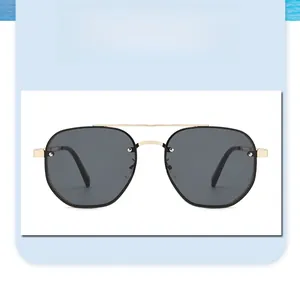 Front view of steampunk sunglasses with gold metal frame and dark grey lenses