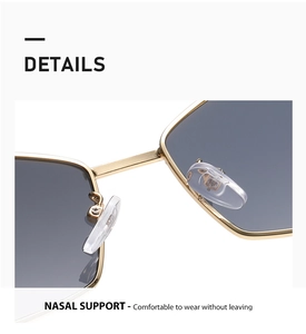 Detailansicht der verstellbaren Silikon-Nasenpads an der goldenen Metallsonnenbrille