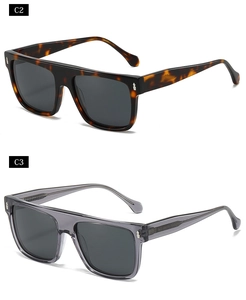 Close-up of retro square sunglasses in tortoiseshell and transparent grey with silver rivets