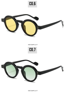 45-degree side view of retro round sunglasses with yellow and green tinted lenses