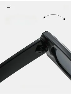 Macro shot of durable metal hinge detail on chic small square black sunglasses
