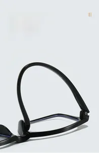 Close-up of TR90 flexible black reading glasses frame showing bendable anti-break temples