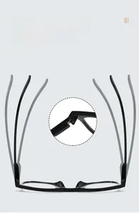 Detail of durable TR frame with flexible spring hinges on vintage oval reading glasses