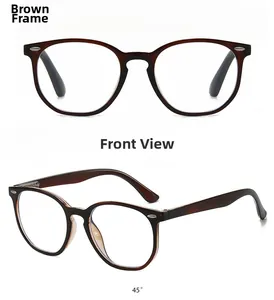 Detail view of tea-colored oval frames with classic rivets and spring hinges