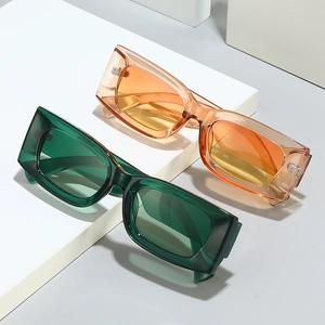 Fashionable rectangle sunglasses in candy green and orange with transparent resin frames